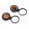 Brosse a cheveux pliable